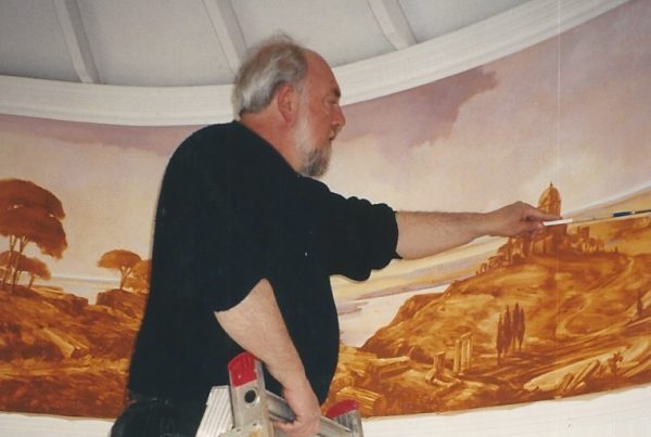 Laine Dahlen painting round mural