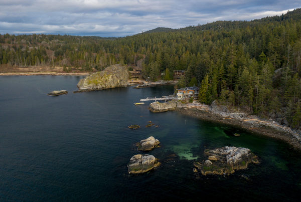 Pointhouse at Sargeant Bay with Mighty Rock & park and forest in the background