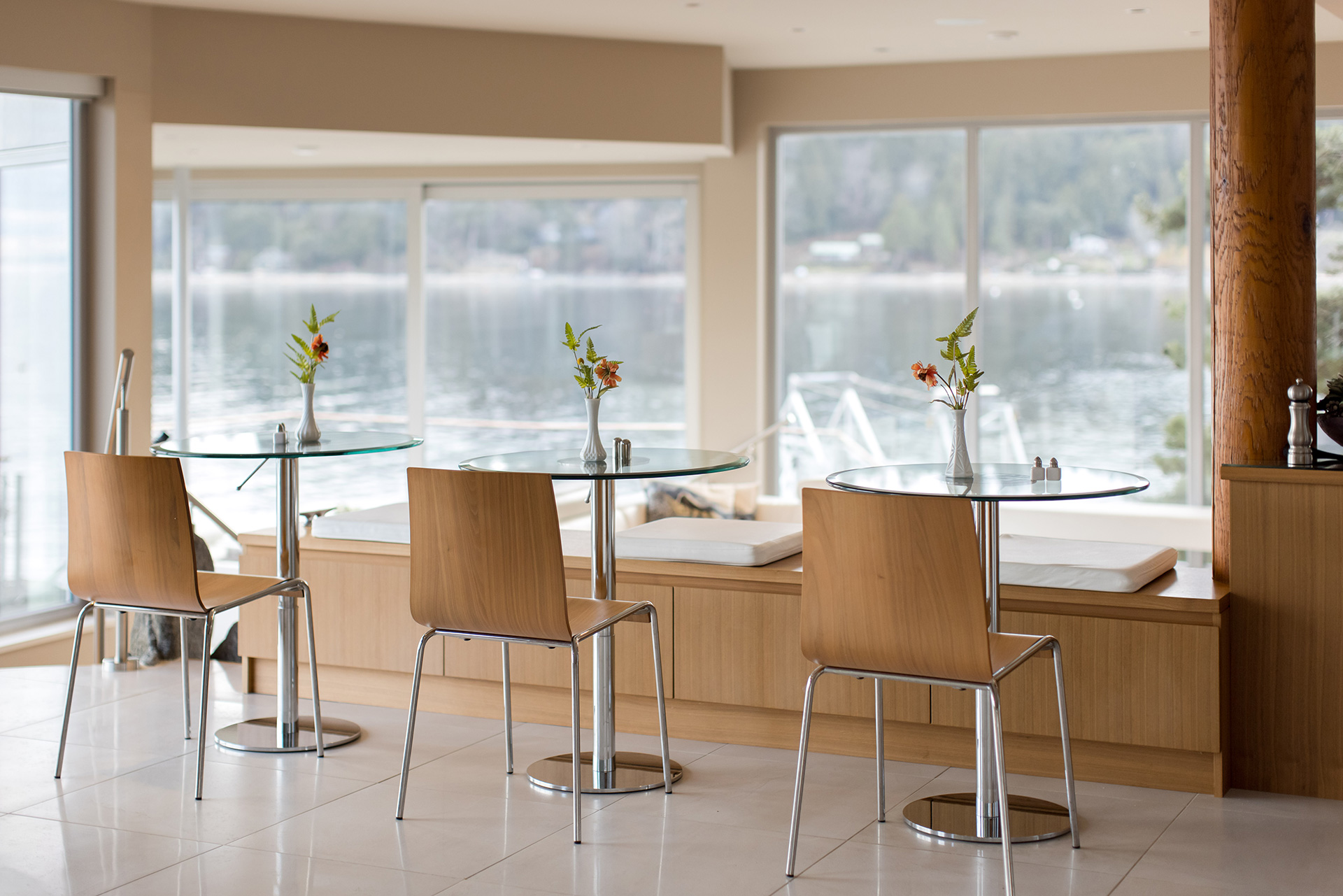 glass chrome bistro tables with walnut chairs